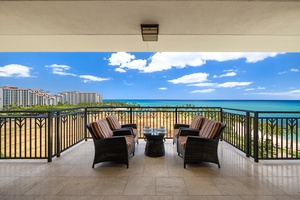 Unwind in your private oceanfront paradise with comfortable seating and breathtaking turquoise waters stretching endlessly before you.