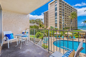 Unwind on the lanai at Royal Kahana 213 with tranquil views of the pool—perfect for morning coffee or evening wine.
