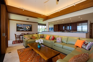 Soaring ceilings and an open floor plan create a luxurious yet relaxed atmosphere for your Big Island stay.