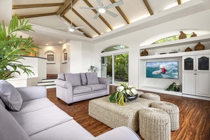 Vaulted ceiling with 55in smart TV make this space that much more inviting