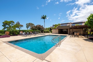 Lounge poolside at Cabana A, featuring a sparkling pool, heated jacuzzi, and plenty of sun-soaked seating to unwind in paradise.