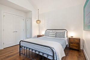 Bright and airy, the Baker Suite features a queen bed and minimalist charm.
