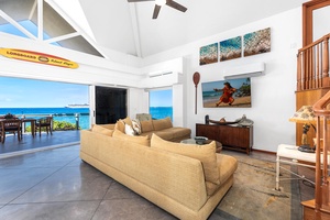 Coastal-inspired living area with open-air design—relax with ocean breezes and endless views.