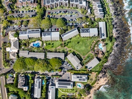 An aerial view of Napili Shores F-252 reveals both pools and its unbeatable location by the sea.