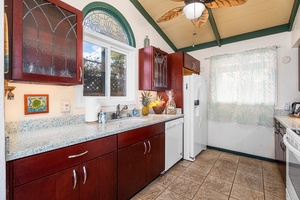 Prepare meals with ease using modern appliances and plenty of counter space.