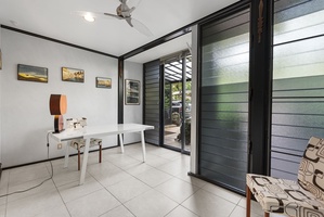 An elegant home office with a contemporary desk and inspiring outdoor views.