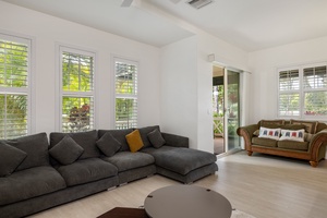 Open and airy living space with direct access to the lanai—ideal for effortless indoor-outdoor living.