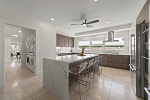 Modern kitchen island with bar seating—perfect for casual breakfasts or evening wine.