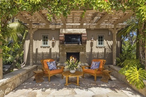 The perfect spot for a movie or sports! Outdoor fireplace and tv.