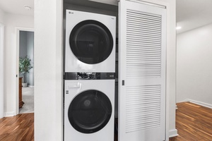 In-unit stacked washer and dryer for added convenience.