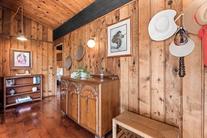 Step into charm with inviting wood paneling, vintage furnishings, and thoughtful touches that make you feel right at home.