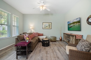Spacious living room with plush seating, island-inspired decor—ideal for relaxing after Ko Olina beach days.