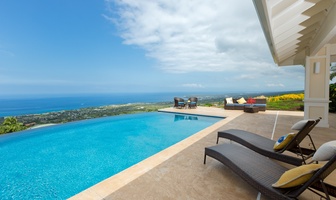 Take in sweeping 20-mile views of the Pacific from your private infinity pool—pure Hawaiian luxury.