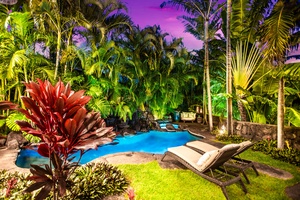 Twilight sky over the pool creates a tropical dreamscape.