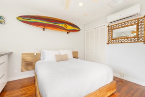 Enjoy restful nights in this bright and airy studio, furnished with a king bed, ceiling fan, and tropical details.