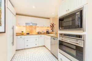 Large kitchen with stainless steel appliances