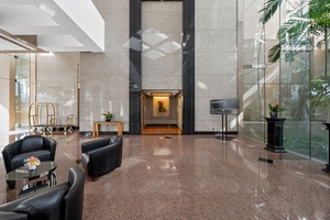 Arrive through the elegant Waikiki Landmark lobby with soaring ceilings and marble finishes.