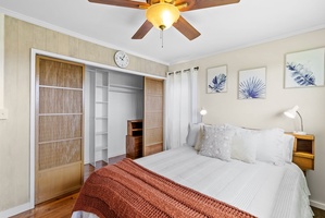 Enjoy the warmth and charm of hardwood floors in this bright and cozy bedroom retreat.