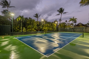 Play an evening match under the well-lit private tennis court.