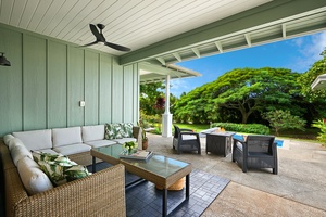 Lanai and gas fire pit with ample seating.