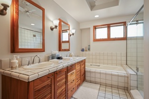 Second bathroom w/dual vanity, soaking tub & walk-in shower.
