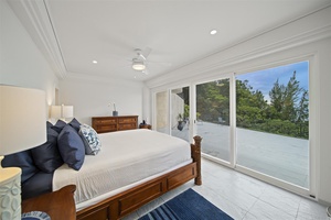 Guest Room #5 (1st floor) w/king bed, ocean views, deck & shared full bath.