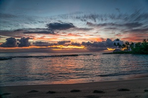 The scenic lagoon with sandy beaches and captivating skies.