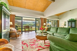 Lounge in the living area with plush sectionals or enjoy your morning coffee on the lanai.