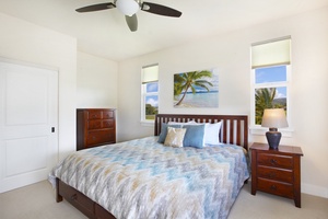 Wake up to soft sunlight and tropical charm in the Guest Room 1upstairs.