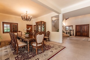 Dine in style in the elegant dining space featuring a long table for ten.