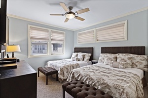 The third bedroom at Wailea Hoolei 93-3 is furnished with two queen-sized beds for ultimate comfort.