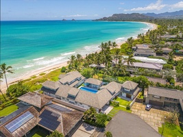 This luxury estate sits perfectly along the pristine shoreline of Kailua Beach.