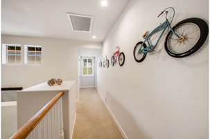Upstairs you will find the Primary bedroom, the guest suite and two ensuite bathrooms.