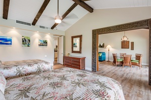 Newly painted 12 foot vaulted open beam ceiling throughout the home makes the space feel even larger