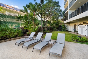 Poolside loungers available for swimmers.