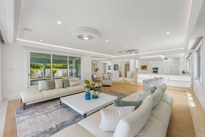 Ocean-facing great room that blends elegance, comfort, and seamless indoor-outdoor flow.