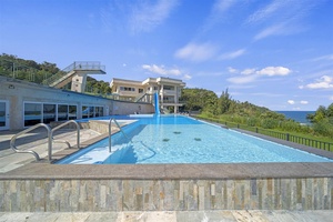 Swim with breathtaking ocean views in this stunning infinity-edge pool.