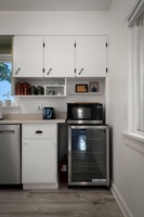 Brew fresh coffee and ease into slow mornings in this thoughtfully stocked kitchenette.