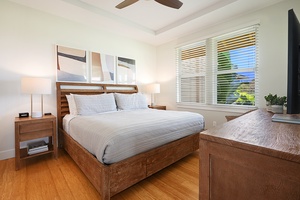 The Primary Bedroom has a king bed, ensuite bathroom, and partial ocean and golf course views