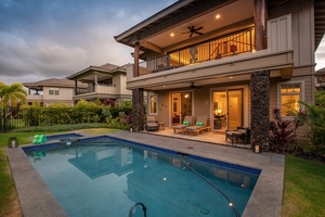 Pool and home at twilight.