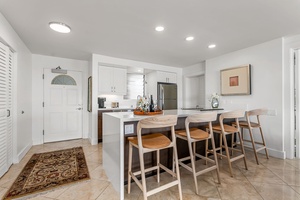 Everything you need, right at your fingertips—from a stainless steel refrigerator to ample prep space, this kitchen helps you vacation like a local.