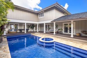 The pool courtyard connects naturally to the home’s indoor and outdoor living spaces