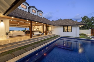 Pool covered lanai twilight view