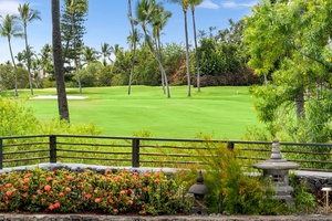Views out toward the manicured golf course just beyond the fence.