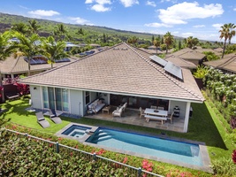 Bird’s-eye view of your tropical oasis with pool, spa, and manicured yard steps from the fairway.