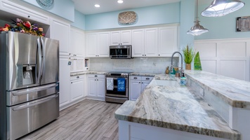 Enjoy the gorgeous kitchen with stainless steel appliances.