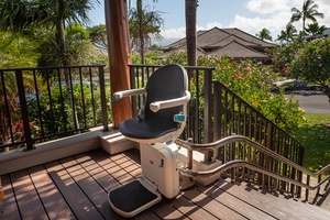 Private front entry with chair lift for added accessibility.