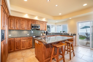 Entertain while you cook in the chef-style kitchen, complete with bar seating and top-tier appliances.