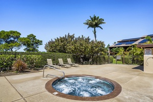 Soak under the stars in one of two hot tubs available to guests, surrounded by tropical landscaping and palm trees.