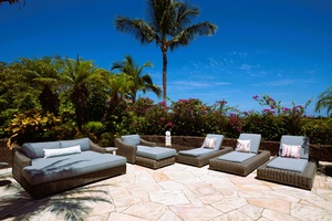 Ocean-view loungers let you bask in the sun or stargaze under island skies.
